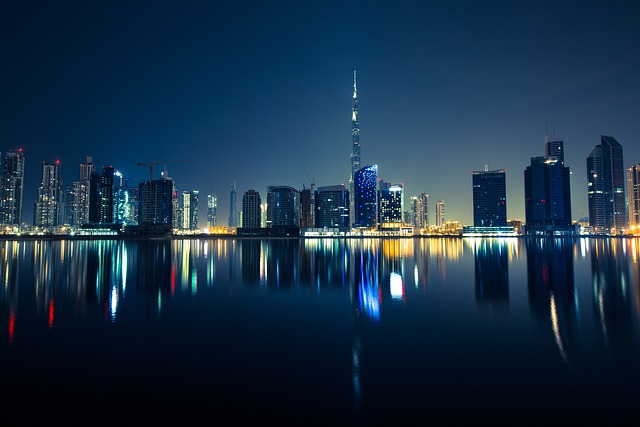 buildings, illuminated, water